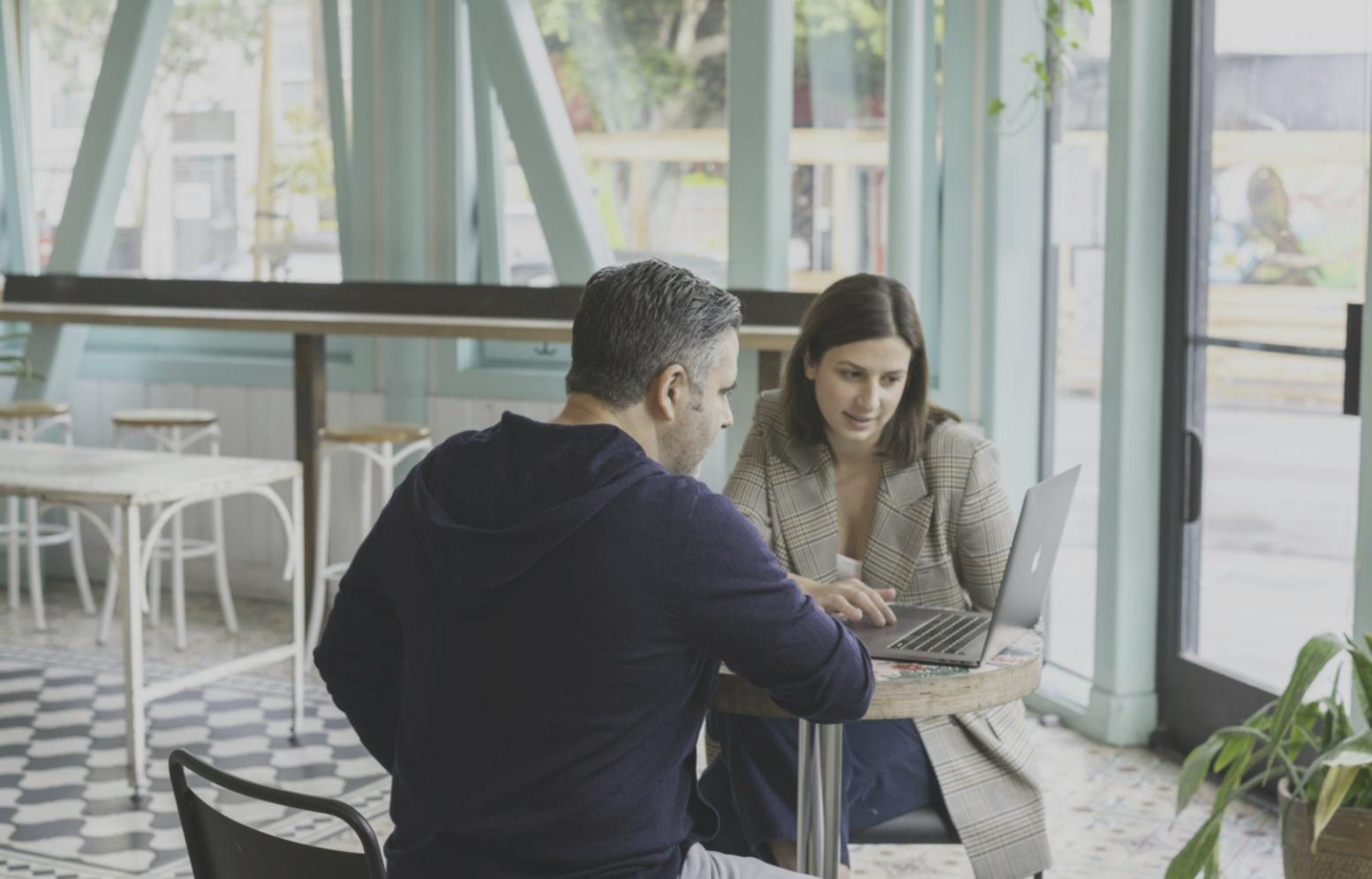 Business professionals collaborating on financial planning and analysis